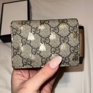 Gucci gold bee wallet